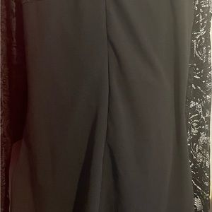 A Large, black beautiful and classy evening dress.